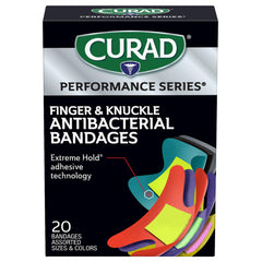Curad Performance Series extreme-hold adhesive bandage securing a wrap during workouts