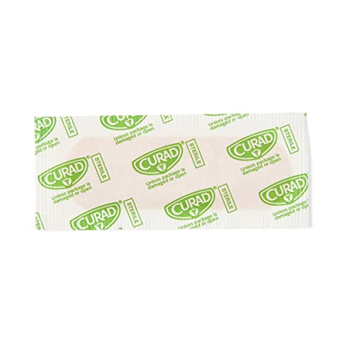 CURAD plastic bandages 1x3 closeup of nonadherent pad for absorbent wound care.