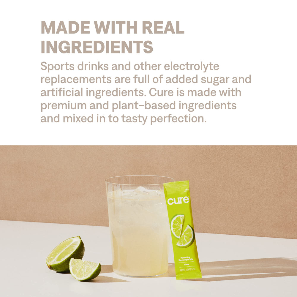 Cure Hydration being stirred into a glass of water for easy preparation.