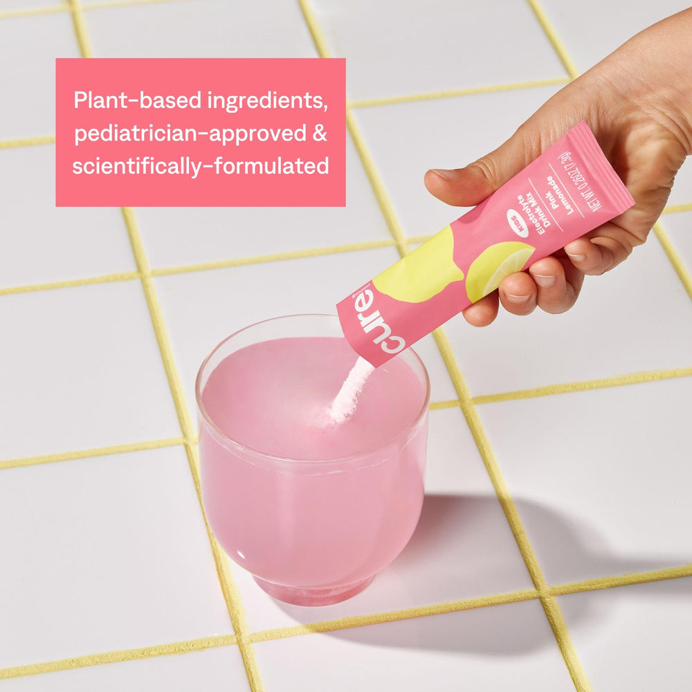 Serving Cure Hydration pink lemonade mix for daily hydration