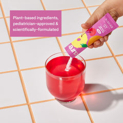 Powder dissolving in water shows easy on-the-go hydration with Cure Hydration.