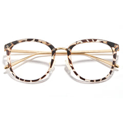 Cyxus blue light glasses for women at a desk reduce digital eye strain.