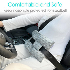 D. Cozy ostomy seatbelt pillow in soft minky dot fabric enhances comfort on long rides.