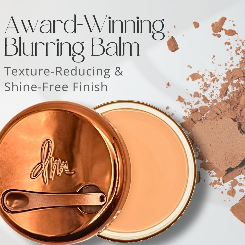 Danessa Myricks Yummy Skin Blurring Balm Powder texture close-up reveals balm-to-powder finish.