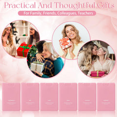 Dansib pink hand sanitizer mist held in hand shows portable size.