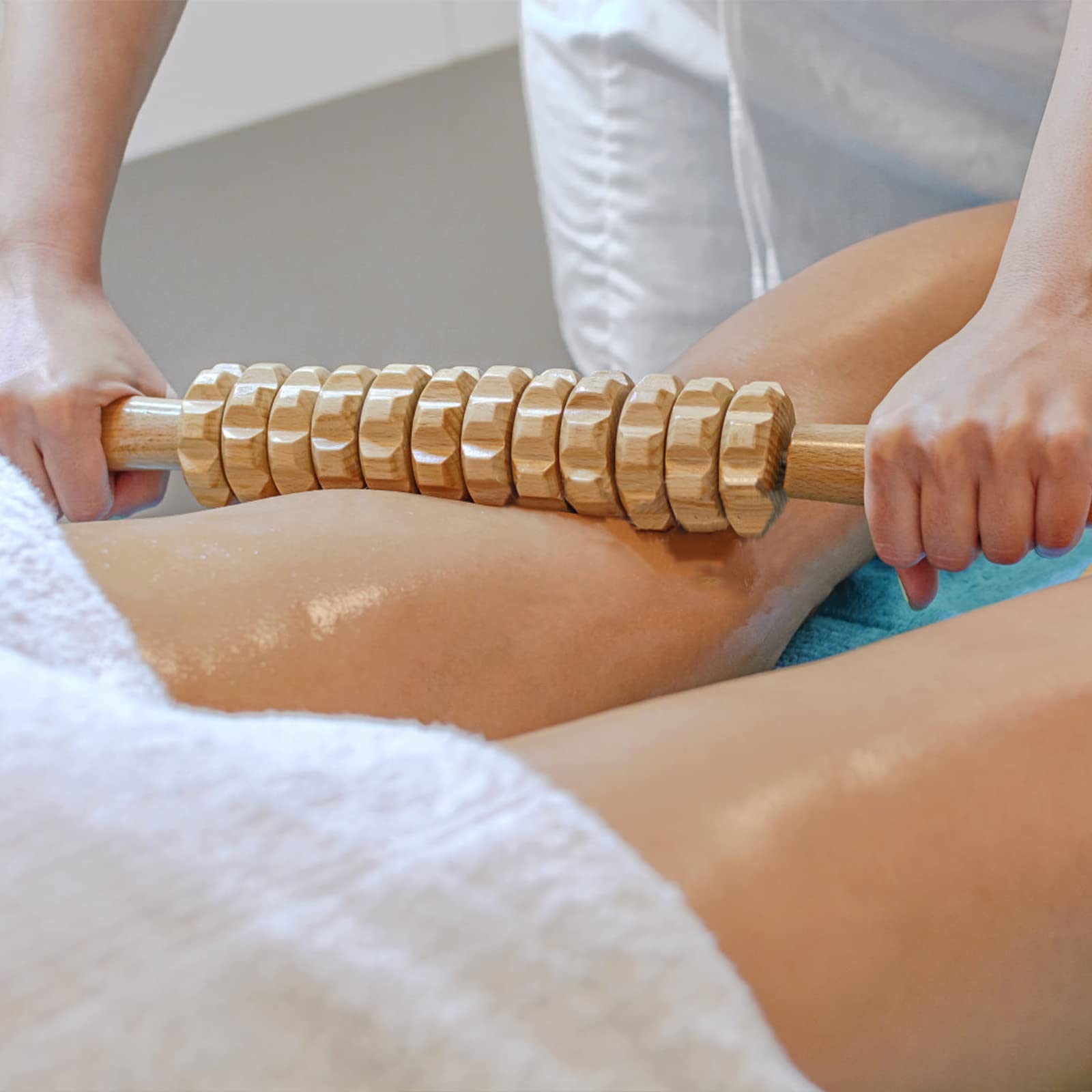 DAOZWUBGIH curved wood therapy roller on leg area to boost circulation and ease tension