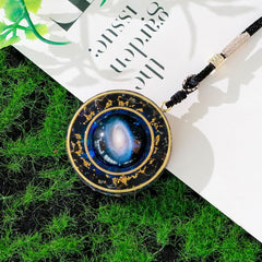 Day Day Up Nebula pendant featuring obsidian detail supports grounding and focus.