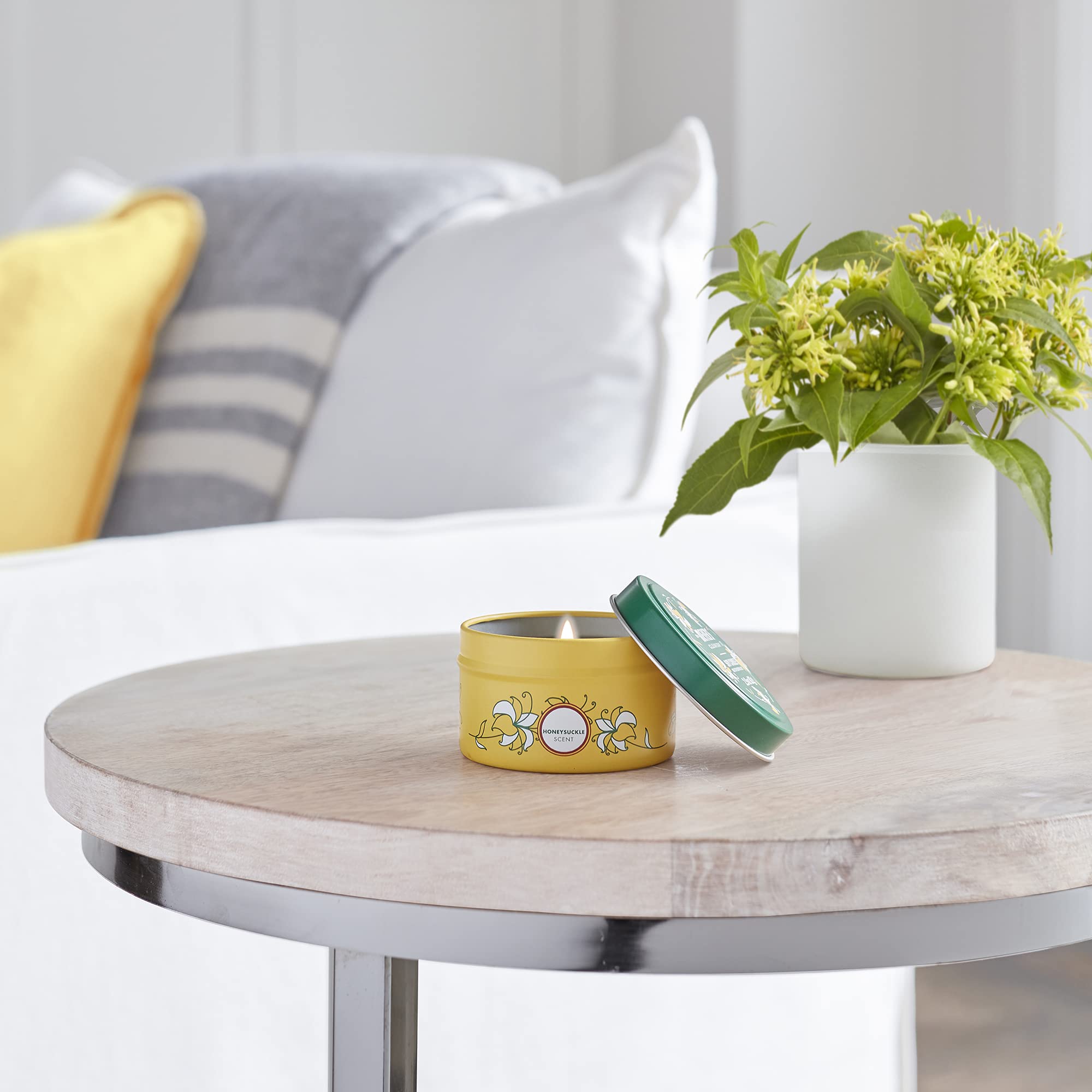 Decorative tin candle packaging and label for Honeysuckle scent