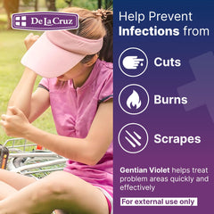 Close-up of De La Cruz Gentian Violet 1% bottle emphasizes topical first aid solution.
