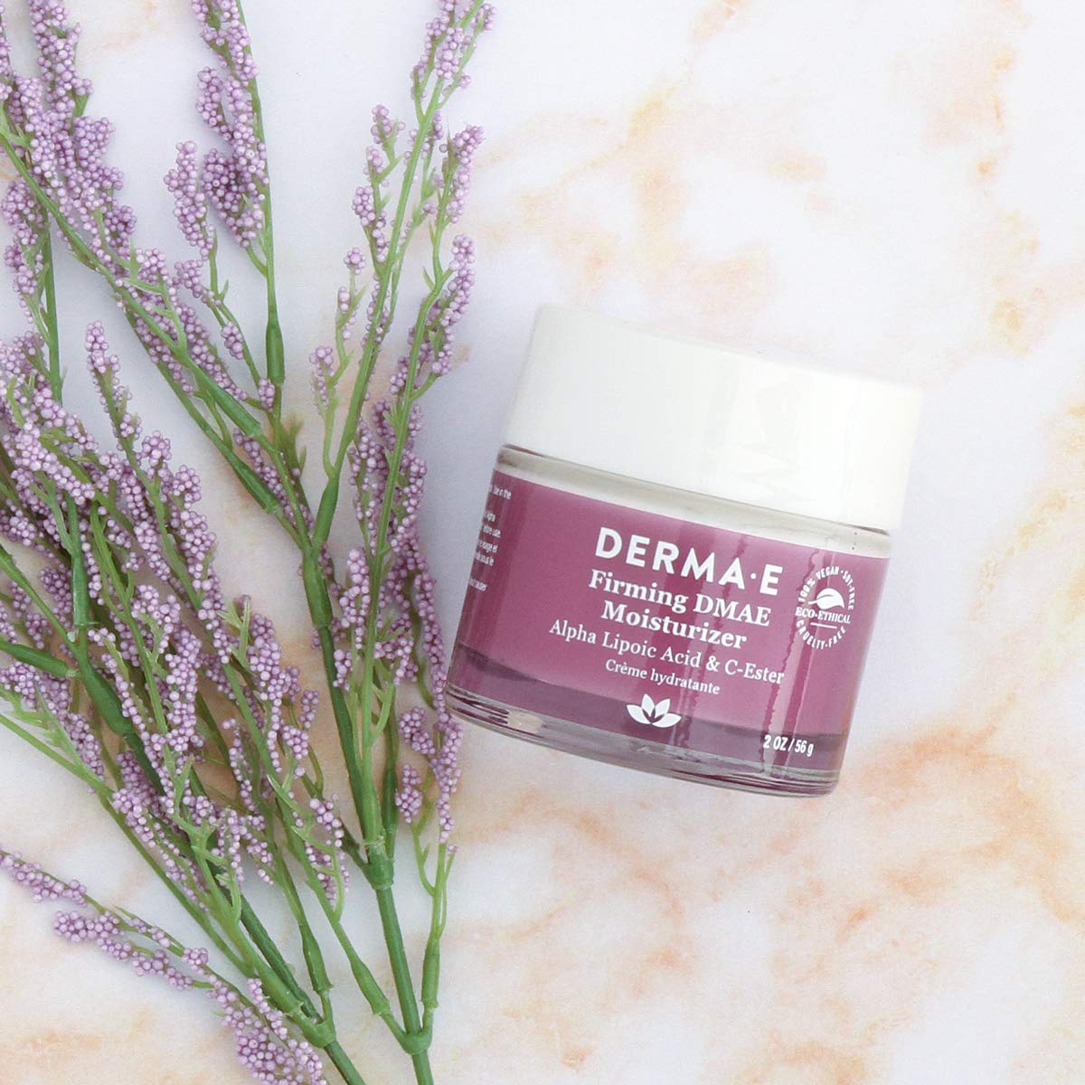 Derma E Firm + Lift cream texture close-up showing smooth consistency.
