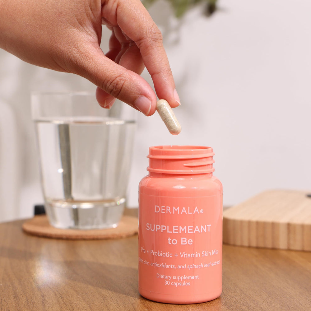 Dermala FOBO Supplemeant glass of water with pill for everyday use.