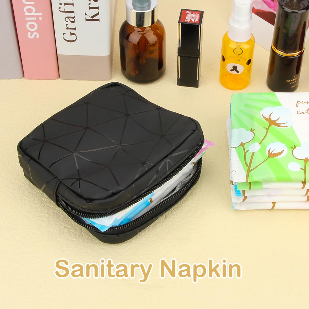 Desing Wish bag interior with middle compartment organizes pads and small items.