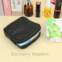 Desing Wish bag interior with middle compartment organizes pads and small items.