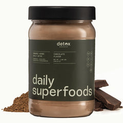 Detox Organics chocolate superfood powder tub ready for daily greens boost