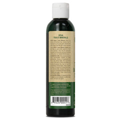 DEVA bottle beside glass of water, highlighting water flavor enhancement.