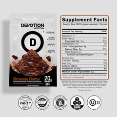 Devotion Nutrition Brownie Batter packets opened and ready to scoop after training.