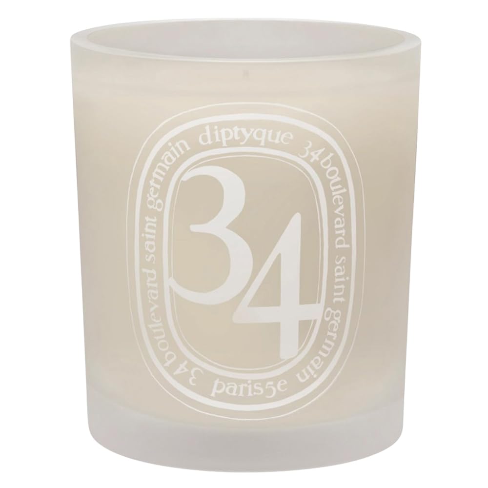 Diptyque 34 scented candle for Nordstrom creates a warm, inviting atmosphere in any room.