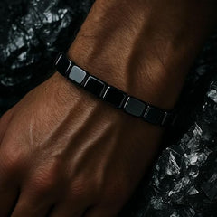 DivaGlamz Hematite Bracelet for Men stretch-fit closeup showing secure elastic thread for comfortable wear.