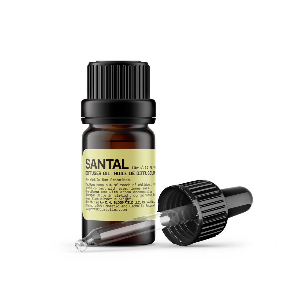 Doratelier Santal Diffuser Oil bottle with papyrus and cardamom aroma enhances spaces beautifully
