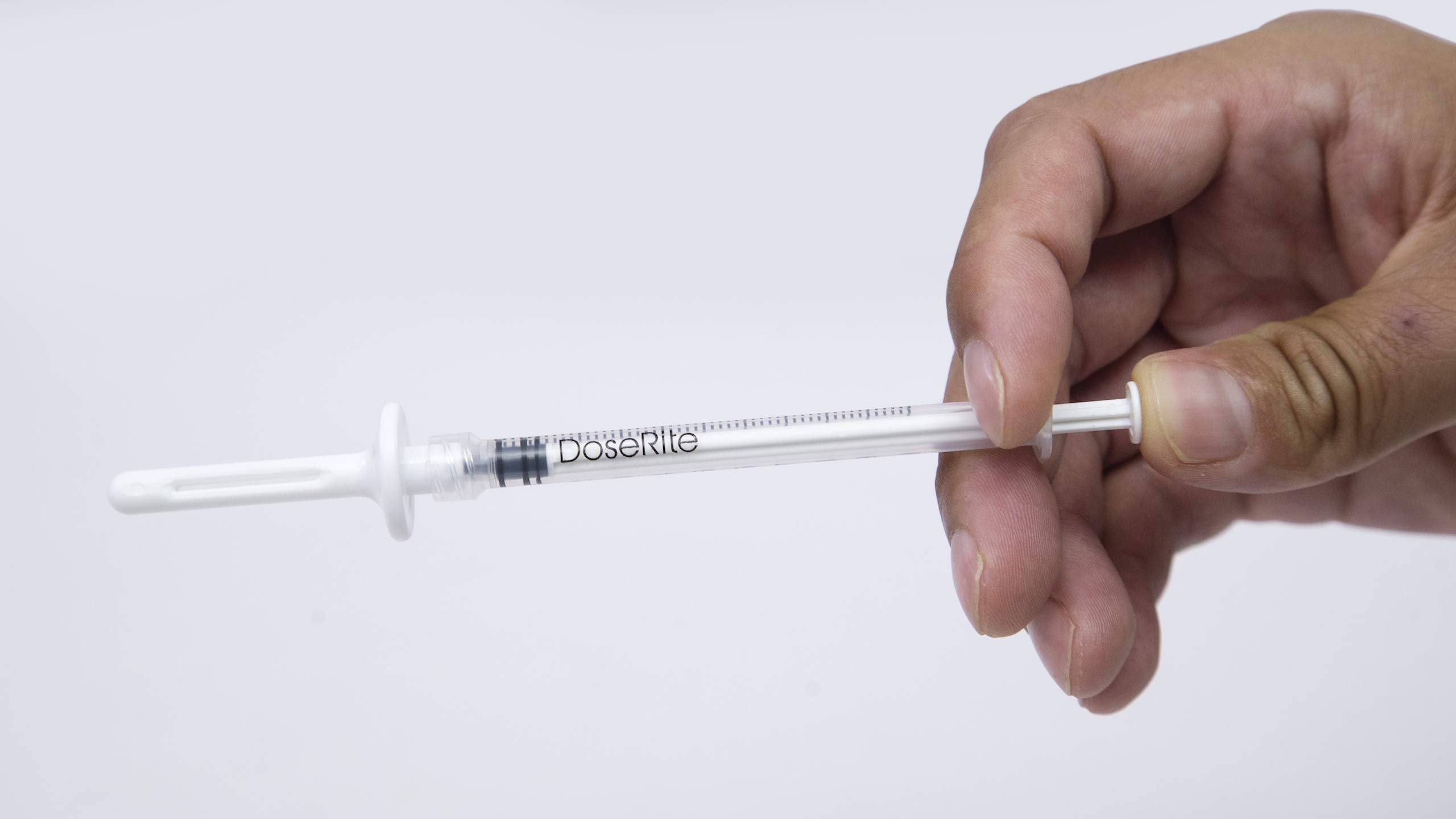 DoseRite tube-to-syringe adapter enables seamless transfer.