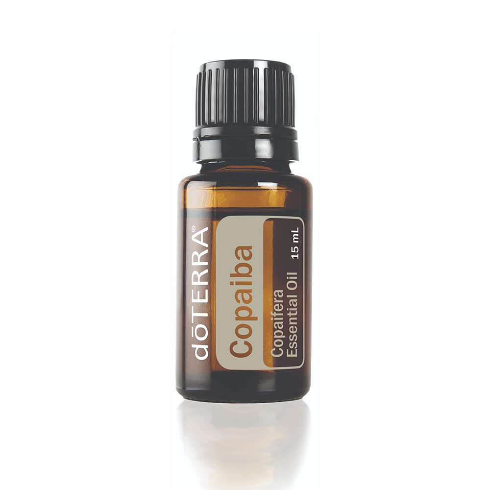 doTERRA Copaiba bottle close-up with resin-rich oil for calming skincare.