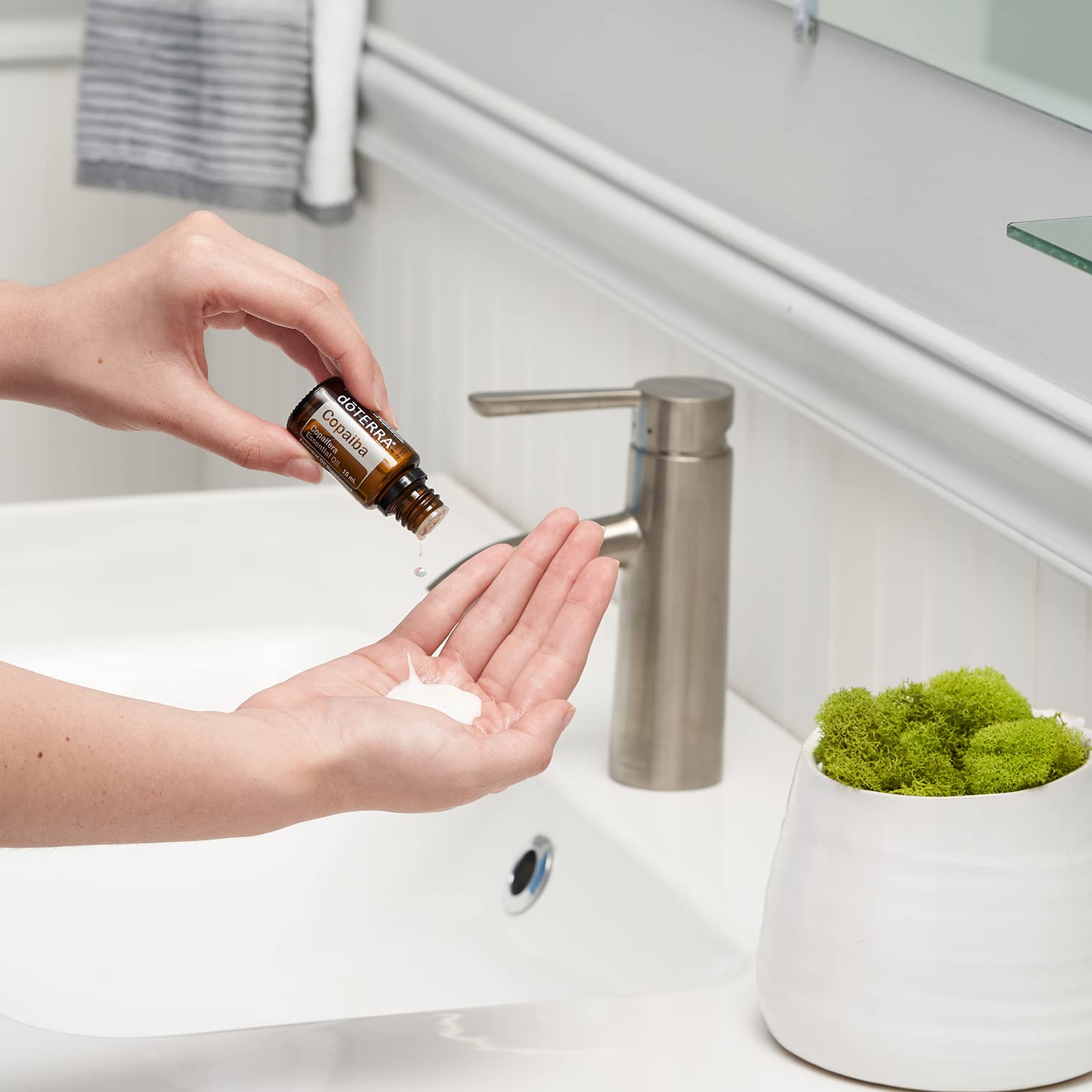 Copaiba-infused skincare product suggesting clear, smooth-looking skin.