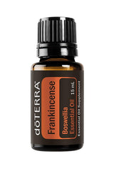 doTERRA Frankincense essential oil bottle diffusing for relaxation.