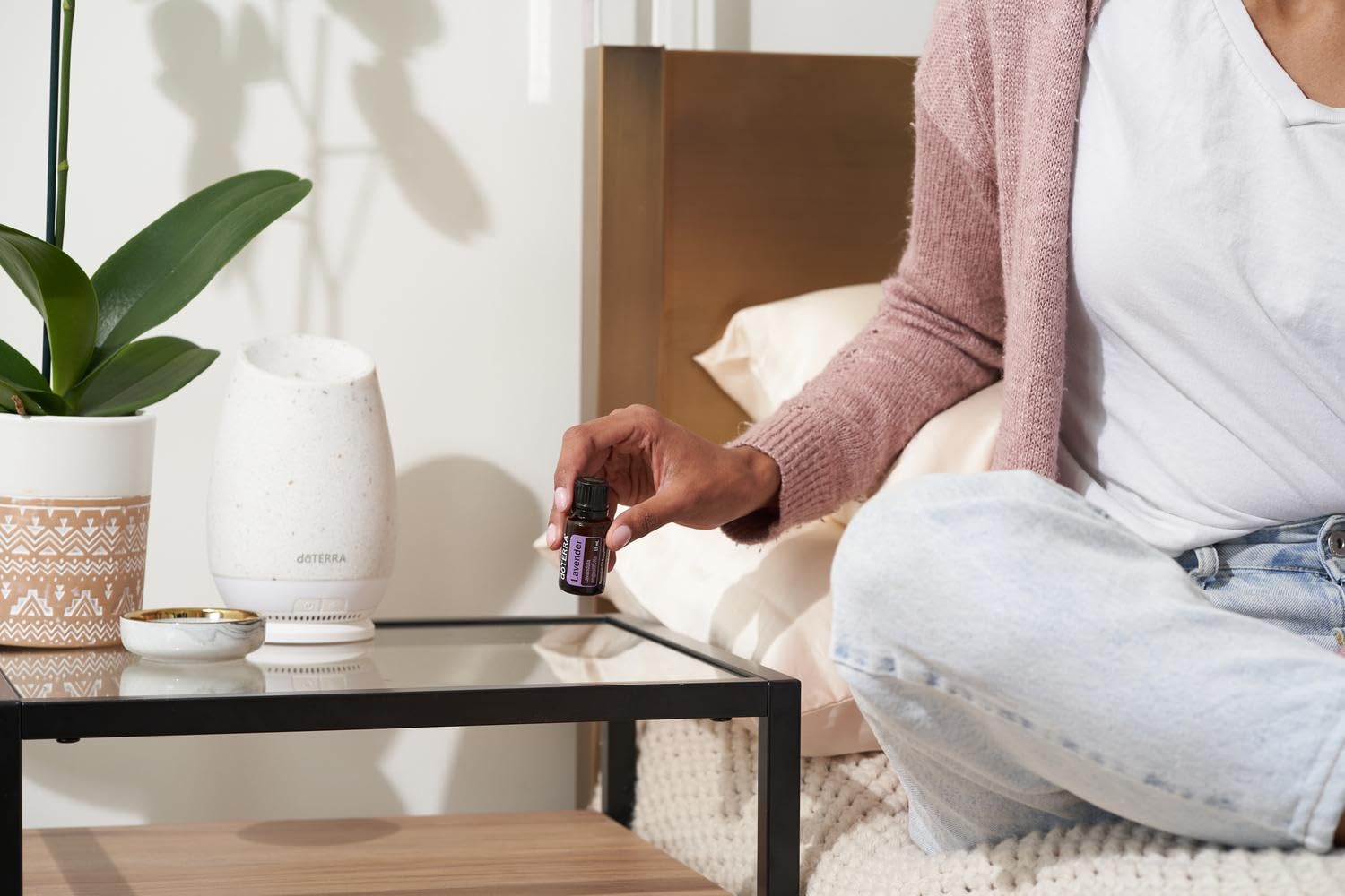 doTERRA Lavender oil bottle with drops for DIY blends.