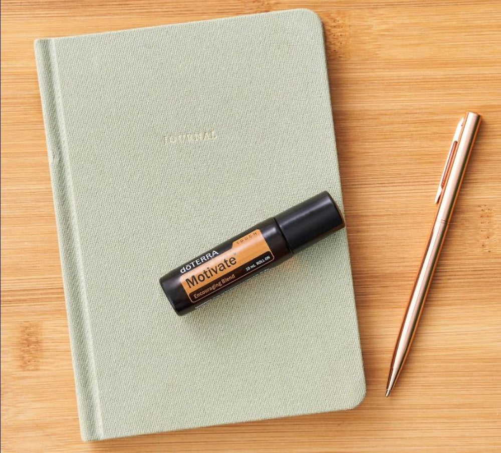 doTERRA Motivate Touch cap removed for easy on-the-go use