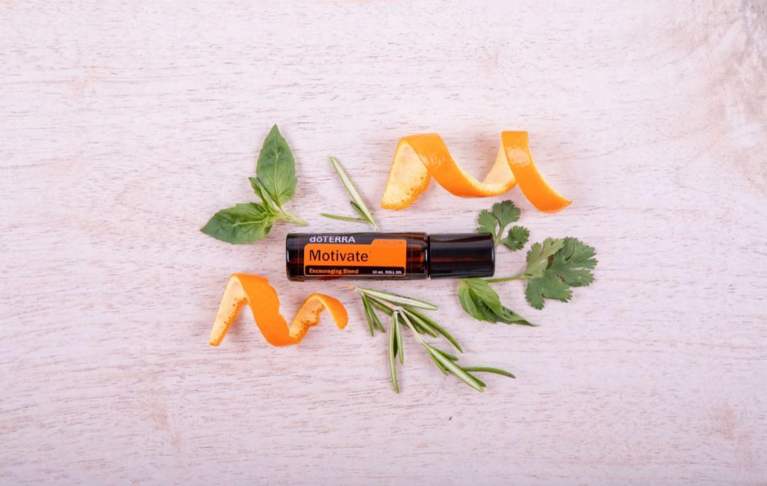 doTERRA Motivate Touch roller applied on skin to boost focus and energy