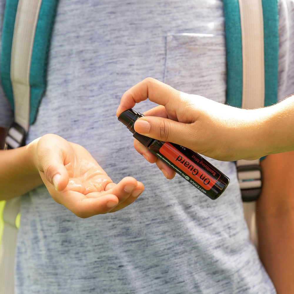 doTERRA On Guard Sanitizing Mist close-up spray for easy on the go use.