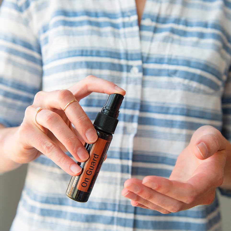 doTERRA On Guard Sanitizing Mist used on tray tables for quick refreshment.