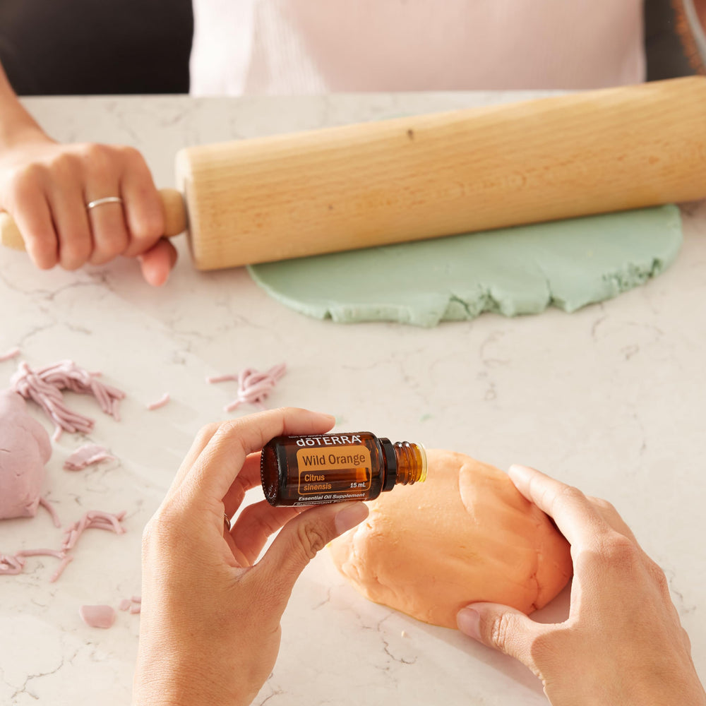 diffuser with doTERRA Wild Orange oil creating a refreshing mist