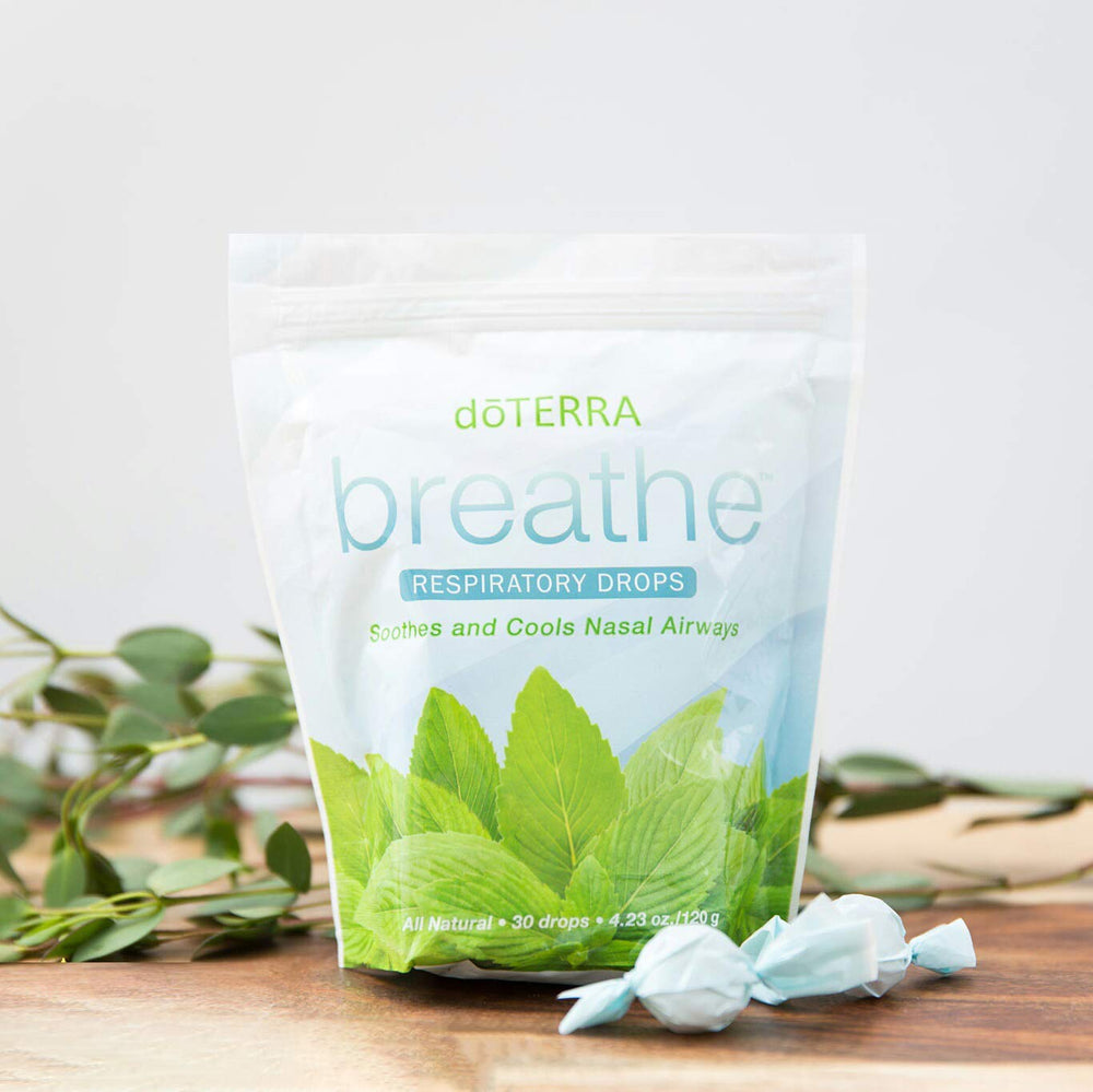 doTERRA Breathe drops dispensing action showing on-the-go use