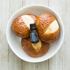 doTERRA DigestZen drops ready to mix for quick ingestion.