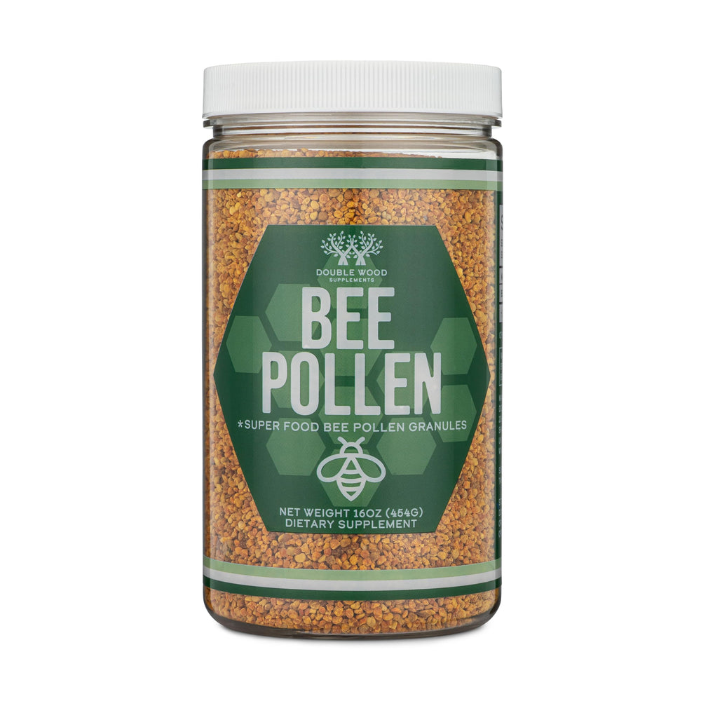 Double Wood Bee Pollen granules close-up showing texture.