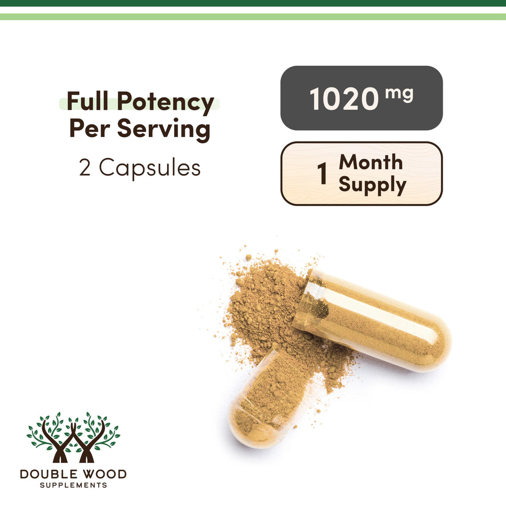 Bottle beside natural ingredients to emphasize clean formulation