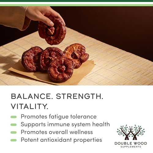 Close-up of Double Wood Reishi capsules showing easy daily intake.