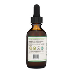 Double Wood Turmeric Drops added to tea for enhanced flavor and potential joint support.
