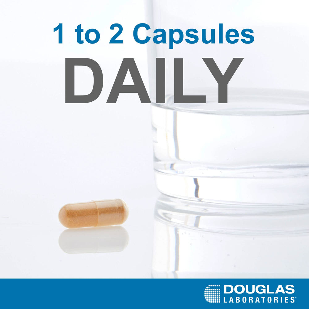 Close-up of Douglas Laboratories DIM Enhanced bottle pouring capsules into hand.