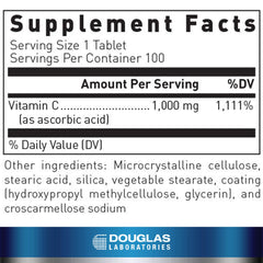 Close-up of Douglas Laboratories Vitamin C tablets for antioxidant support.