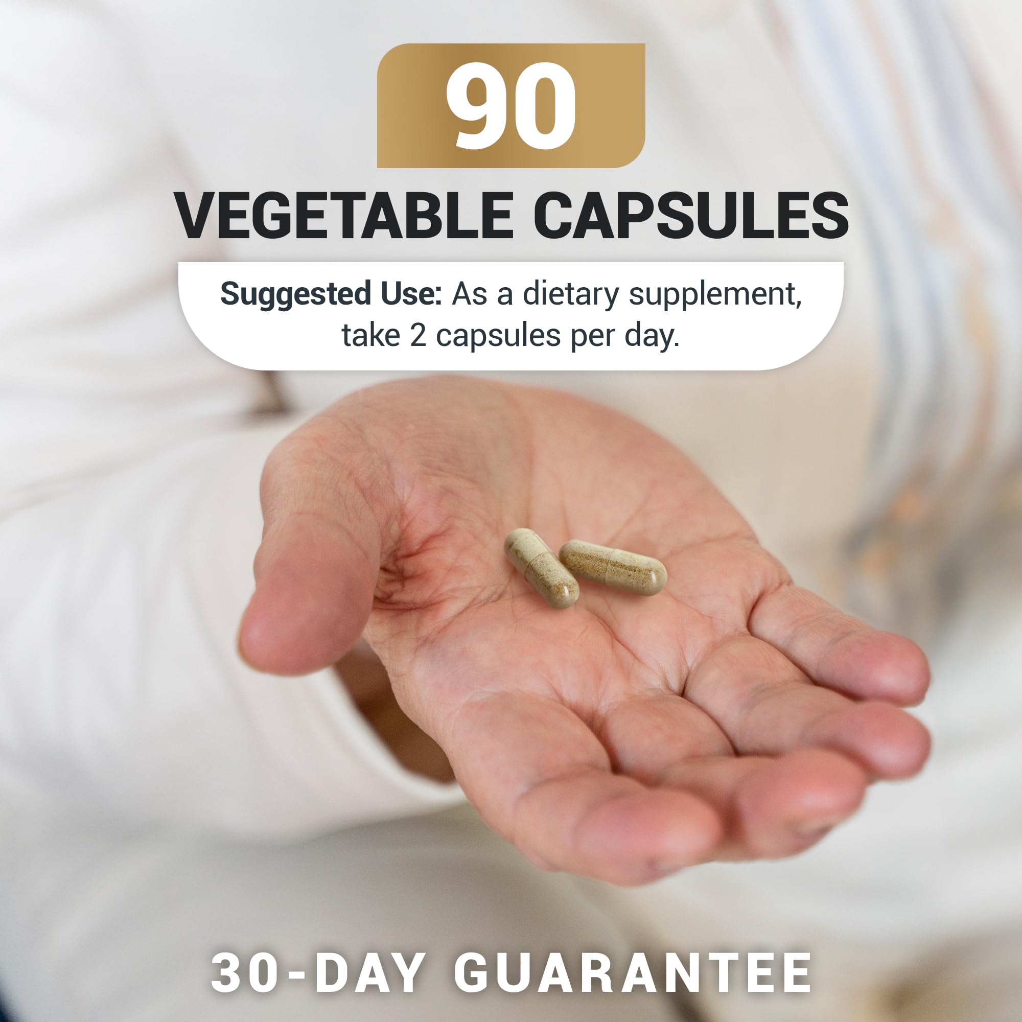 Dr. Berg Ashwagandha capsules in hand for on-the-go wellness