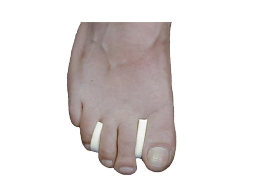 Dr. Jill's Foot Pads toe separator foam with tail eases toe pinching in daily footwear.