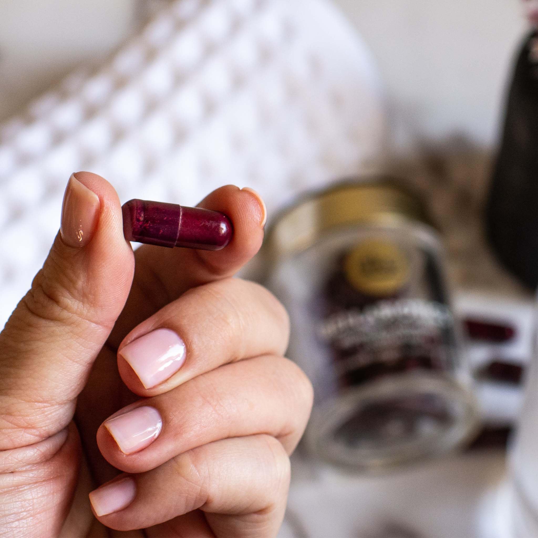 Dr. Kellyann Bellabiotics capsules close-up showcases easy daily use for digestion and glow.