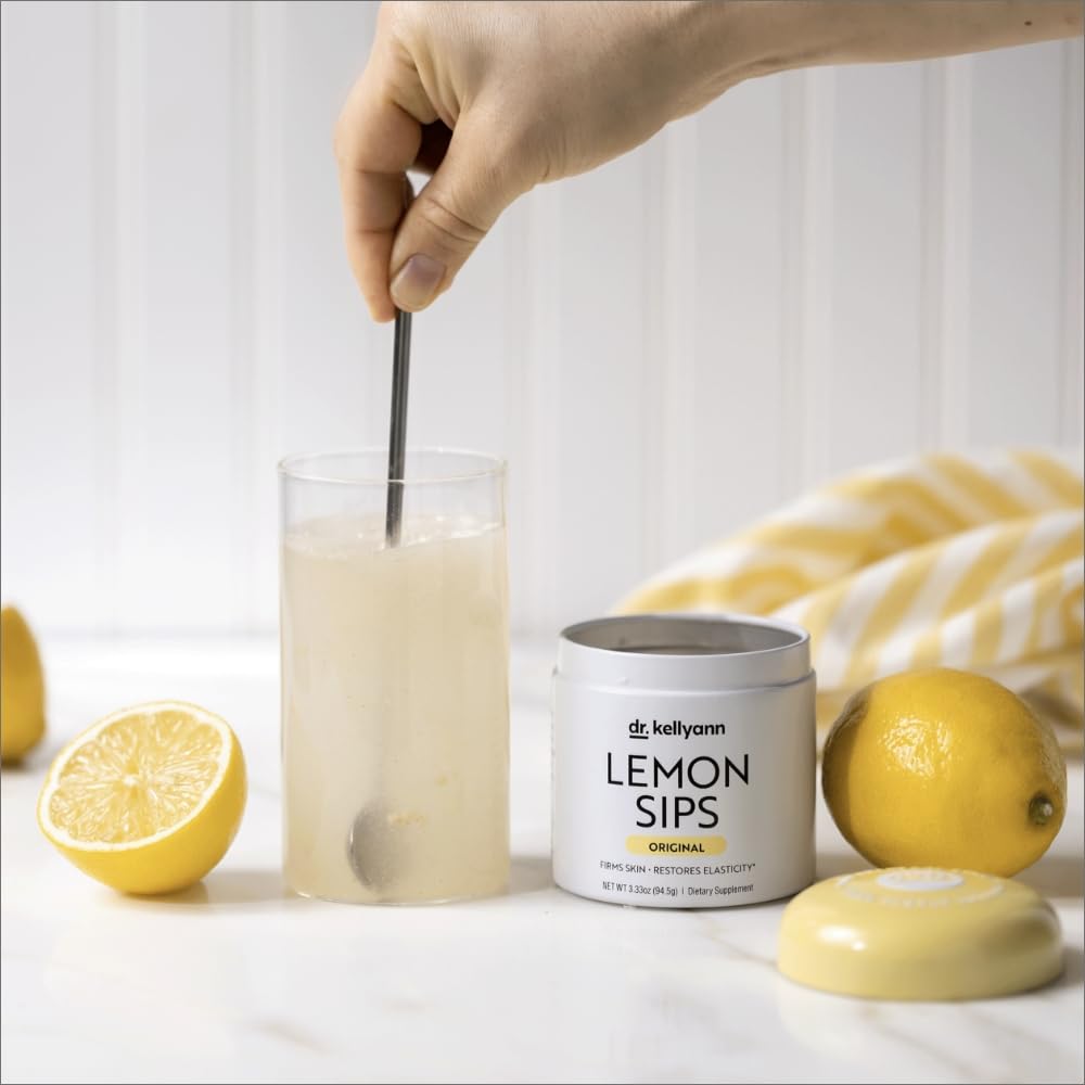 Dr. Kellyann Lemon Sips glass filled with a vibrant citrus drink.