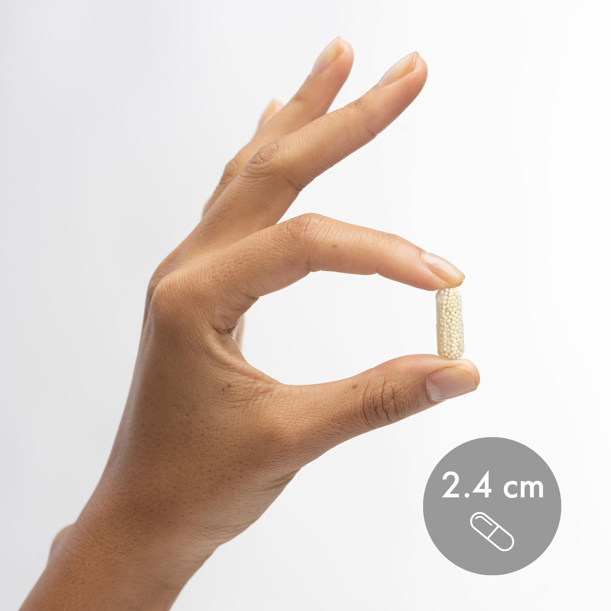 Dr. Mercola L-Arginine Advanced capsules being poured for daily use