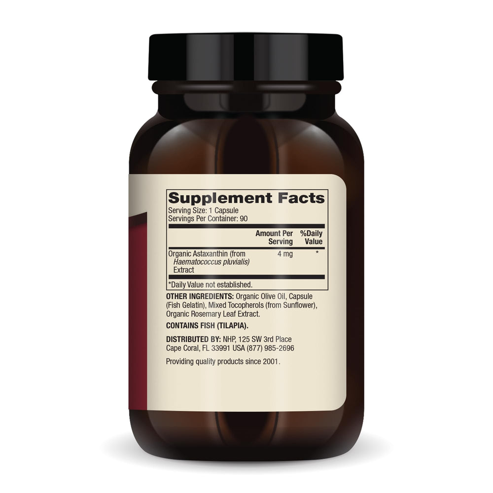 Astaxanthin capsules close-up emphasizing olive oil absorption