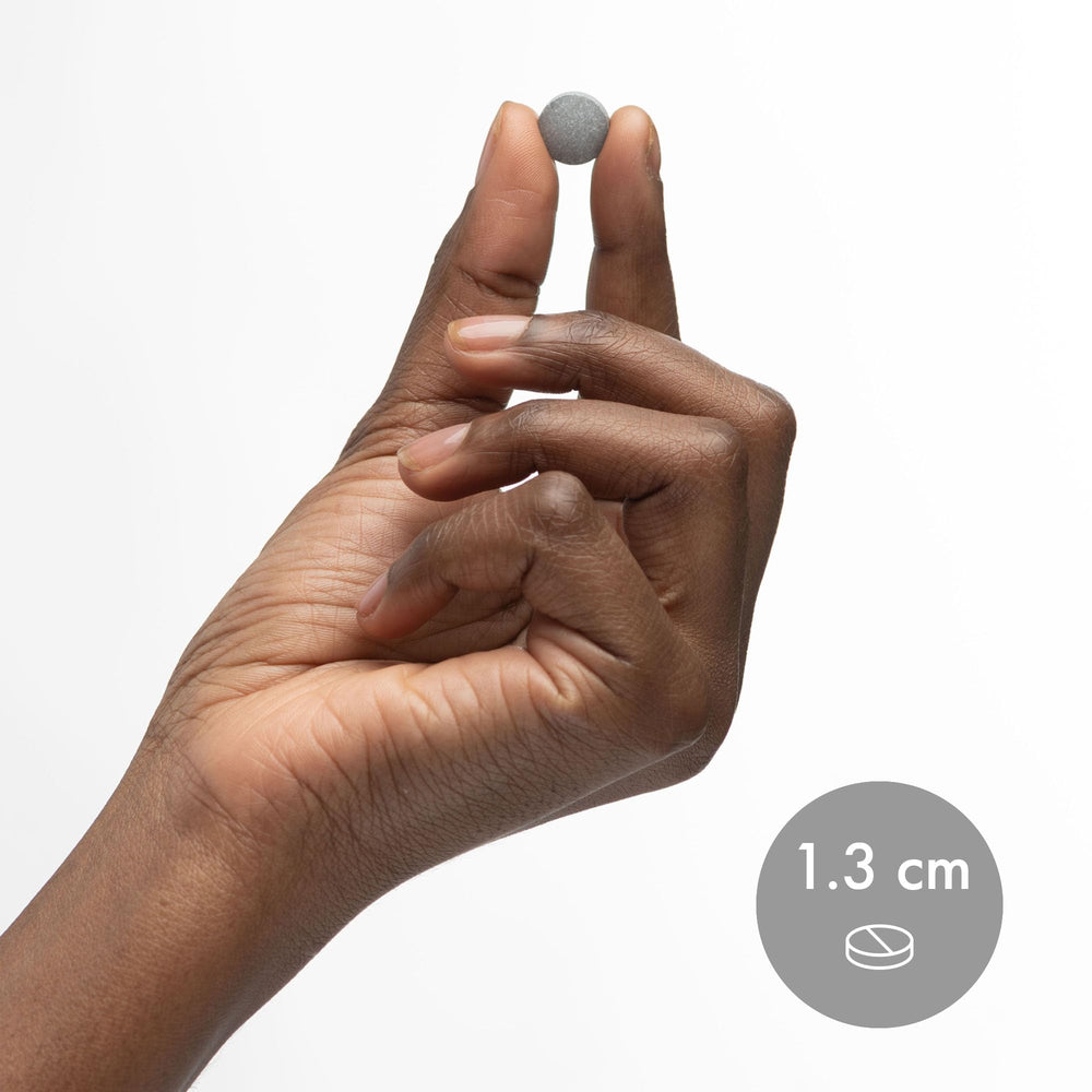 Dr Mercola H2 tablets dissolving in a glass of 480 ml water