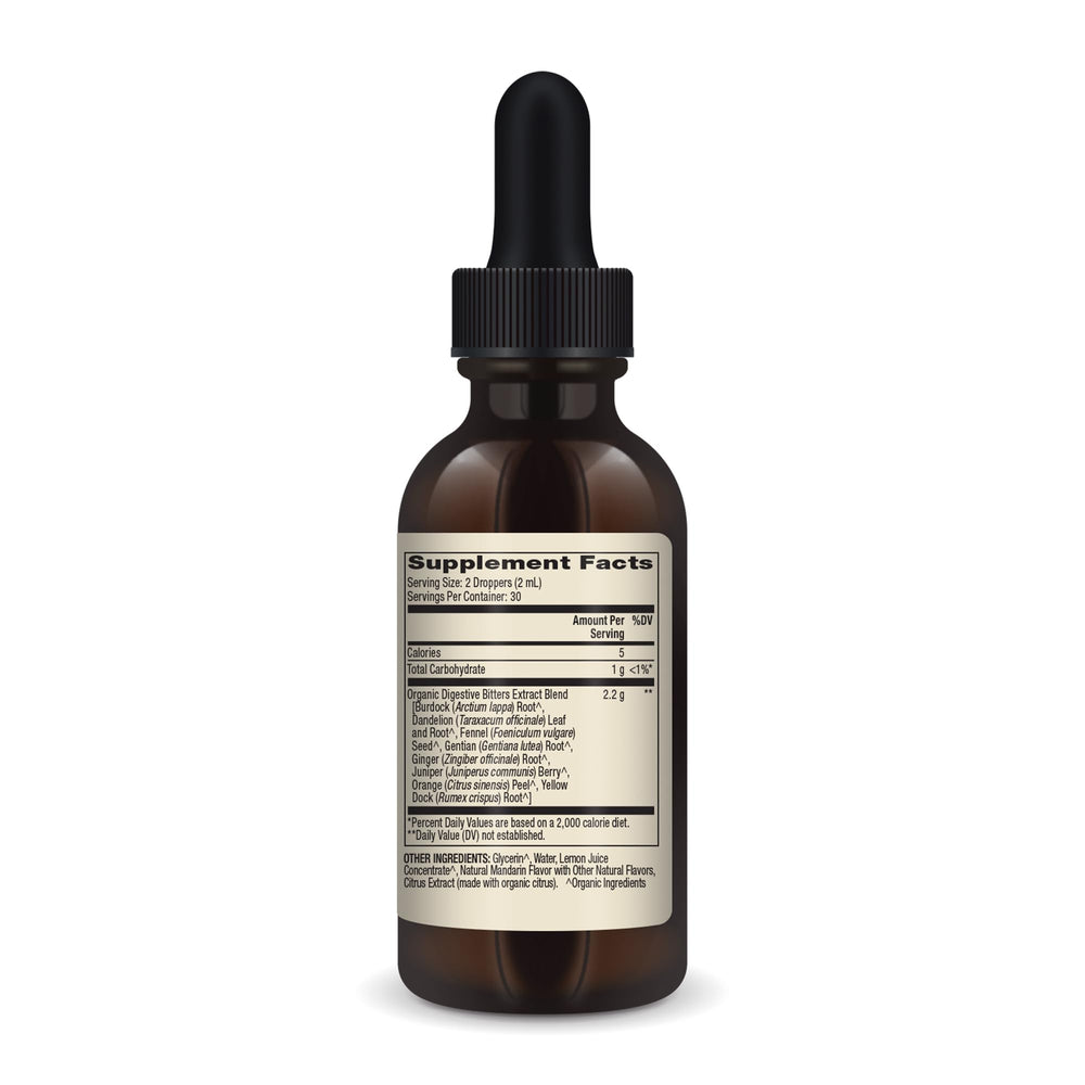 Dr. Mercola bitters liquid drops pour beside glass for convenient use