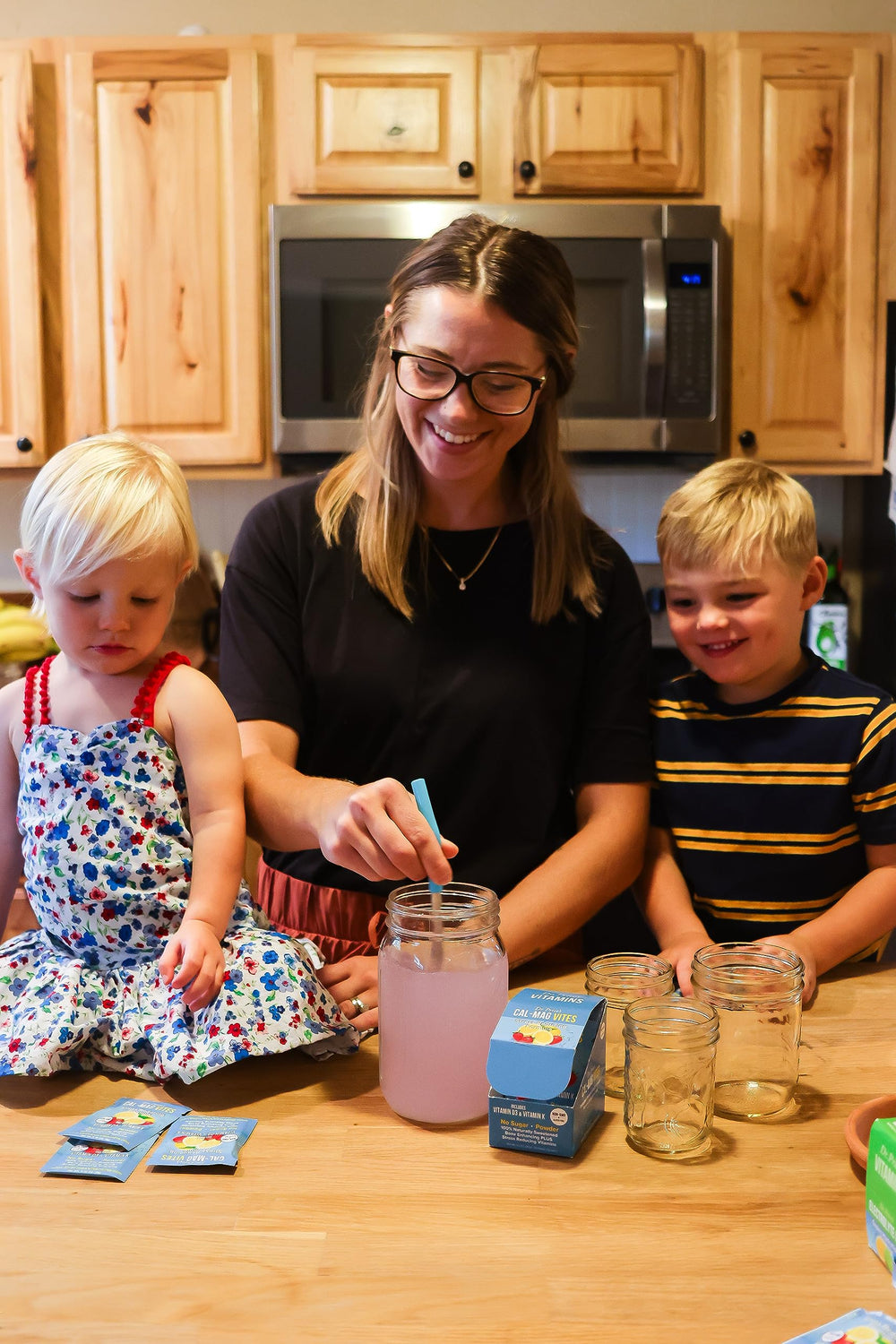 Family using Dr Price's Cal-Mag Vites at home for convenient daily intake.